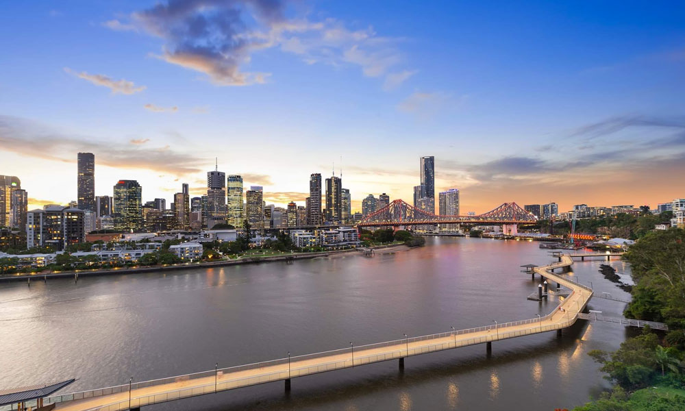 Brisbane photogrpahy 2022 - image shows BrisbaneCBD in background with river and freeway in foreground.